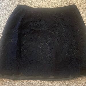 Short black lace skirt… perfect for a night out
